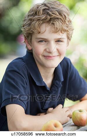 Young boy smiling View Large Photo Image Stock Photograph - Young boy smiling. Fotosearch