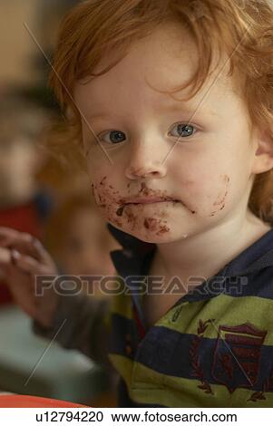 Young boy with messy face View Large Photo Image Stock Image - Young boy with messy face. Fotosearch