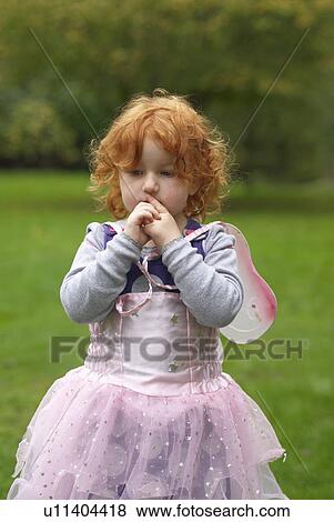 Young girl in fairy outfit in garden View Large Photo Image Stock Photo - Young girl in fairy outfit in garden. Fotosearch