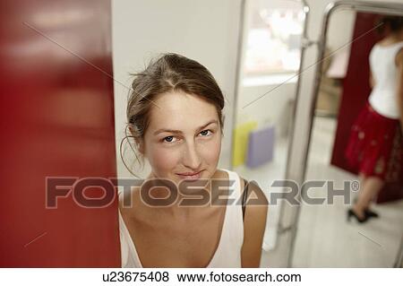 Stock Photo - Young lady shopping. Fotosearch