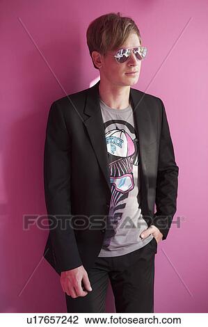 Young male with pink shades View Large Photo Image Stock Image - Young male with pink shades. Fotosearch