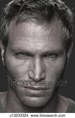 Picture - Young man looking bad. Fotosearch