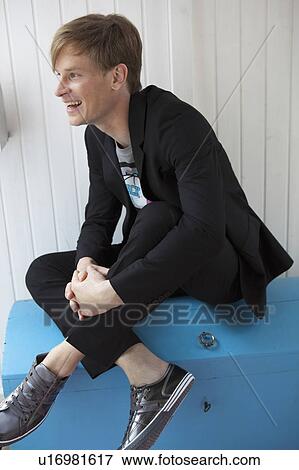 Young man relaxing View Large Photo Image Stock Photo - Young man relaxing. Fotosearch