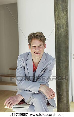 Stock Photo - Young man smiling. Fotosearch