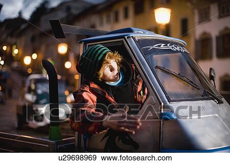 Stock Photo - Young moped rider. Fotosearch