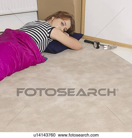 Young woman taking a rest from DIY View Large Photo Image Stock Image - Young woman taking a rest from DIY. Fotosearch