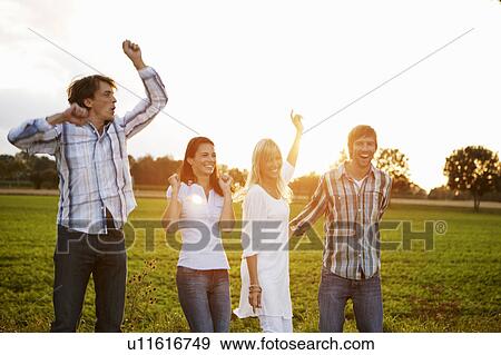 2 couples dancing ouside at sunset View Large Photo Image Stock Photo - 2 couples dancing ouside at sunset. Fotosearch