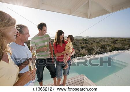 3 generations by the pool View Large Photo Image Stock Photo - 3 generations by the pool. Fotosearch