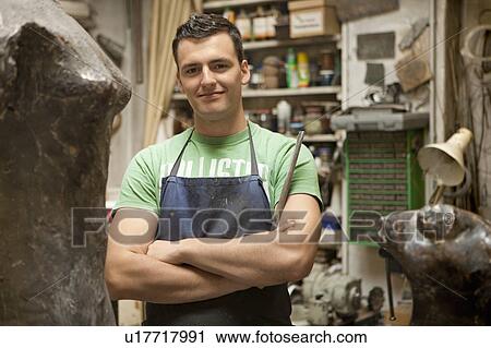 Artist working on sculpture View Large Photo Image Stock Image - Artist working on sculpture. Fotosearch