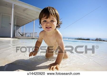 Baby crawling in pool View Large Photo Image Stock Image - Baby crawling in pool. Fotosearch