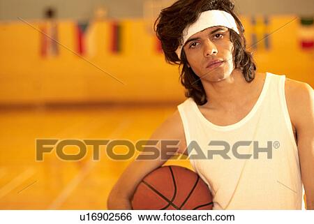 Stock Photograph - Basketball player and ball. Fotosearch