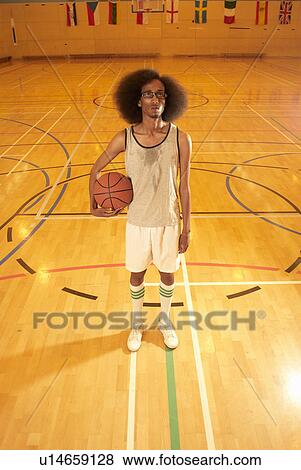 Stock Photo - Black basketball player. Fotosearch