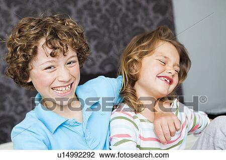 Boy hugging girl View Large Photo Image Stock Image - Boy hugging girl. Fotosearch