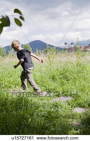 Stock Image - Boy running. Fotosearch