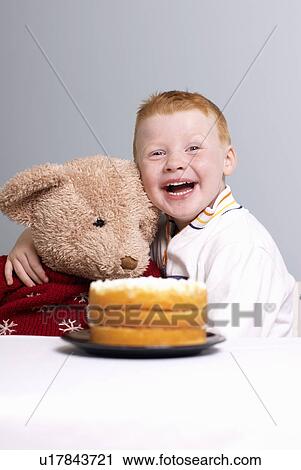 Boy with teddy and cake View Large Photo Image Stock Image - Boy with teddy and cake. Fotosearch