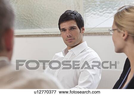Stock Photo - Business man in the meeting room. Fotosearch
