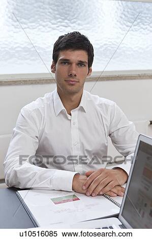 Business man reviewing client profile View Large Photo Image Stock Photography - Business man reviewing client profile. Fotosearch