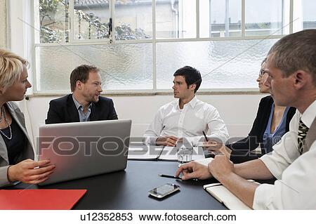 Stock Image - Business meeting in the conference room. Fotosearch