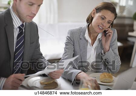 Business people having breakfast View Large Photo Image Picture - Business people having breakfast. Fotosearch