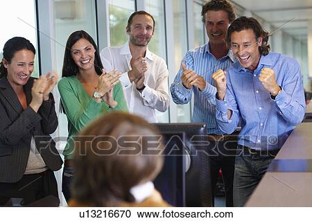 Business team closing a deal View Large Photo Image Stock Image - Business team closing a deal. Fotosearch