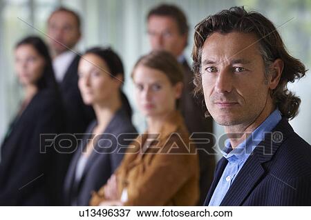 Business team smiling View Large Photo Image Stock Photo - Business team smiling. Fotosearch