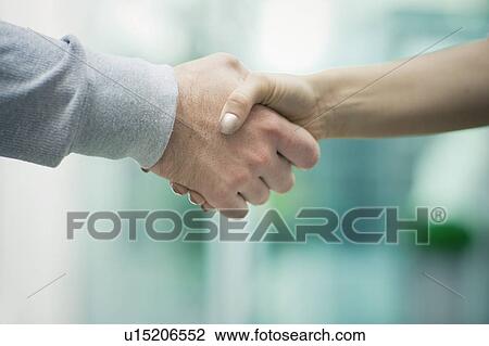 Businesspeople shaking hands View Large Photo Image Stock Image - Businesspeople shaking hands. Fotosearch