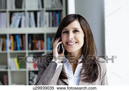 Businesswoman talking View Large Photo Image Stock Photography - Businesswoman talking. Fotosearch