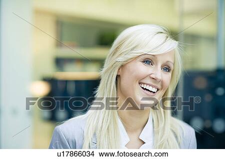 Picture - Businesswomen laughing. Fotosearch