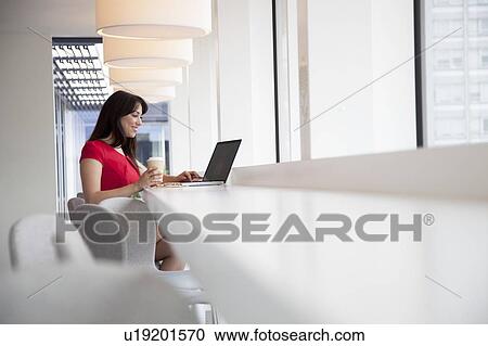 Businesswomen using laptop View Large Photo Image Stock Image - Businesswomen using laptop. Fotosearch