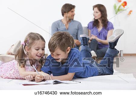 Children playing while parents talk View Large Photo Image Stock Image - Children playing while parents talk. Fotosearch