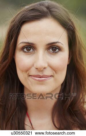 Stock Image - Close-up portrait of brunette. Fotosearch