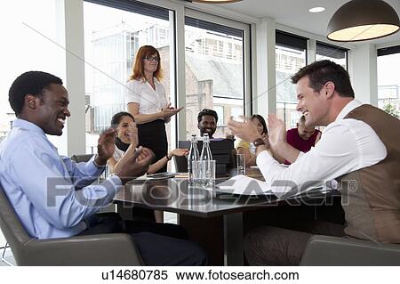 Colleagues congratulating each other View Large Photo Image Stock Photography - Colleagues congratulating each other. Fotosearch