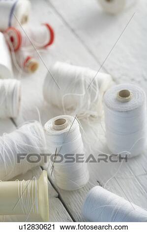 Collection of white cotton reels View Large Photo Image Stock Image - Collection of white cotton reels. Fotosearch