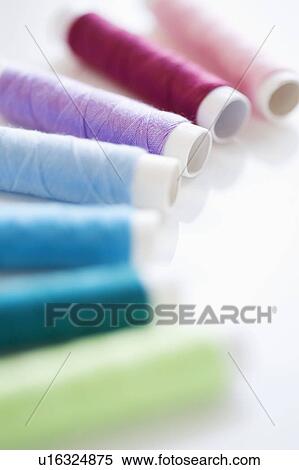 Stock Photography - Colorful cotton reels. Fotosearch