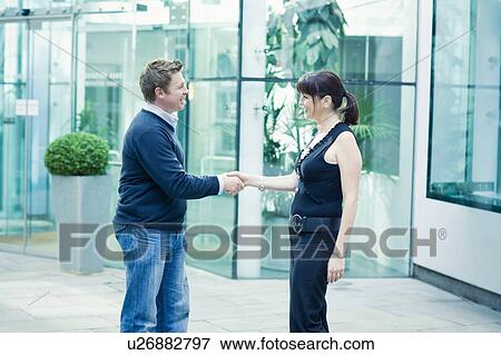 Couple greeting View Large Photo Image Stock Photo - Couple greeting. Fotosearch