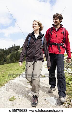 Couple hiking View Large Photo Image Stock Photo - Couple hiking. Fotosearch