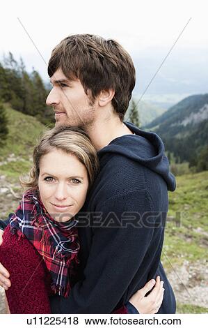 Stock Photo - Couple hugging. Fotosearch