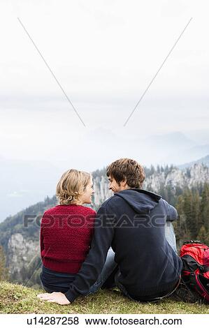 Couple in front of mountains View Large Photo Image Stock Photo - Couple in front of mountains. Fotosearch