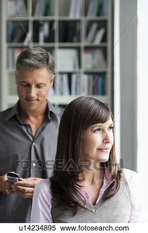 Stock Photography - Couple in office. Fotosearch