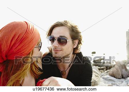 Stock Photograph - Couple looking to each other. Fotosearch