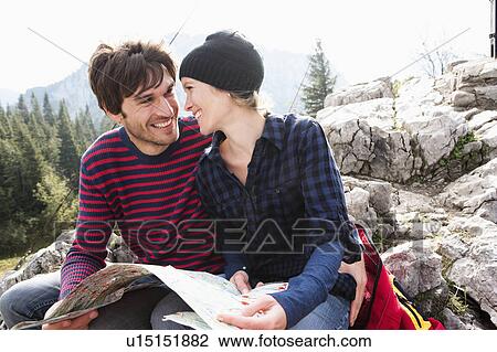 Couple reading map View Large Photo Image Stock Image - Couple reading map. Fotosearch