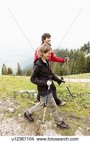 Couple walking fast View Large Photo Image Picture - Couple walking fast. Fotosearch