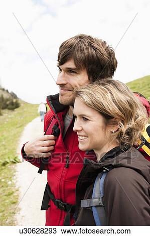 Stock Image - Couple watching panorama. Fotosearch