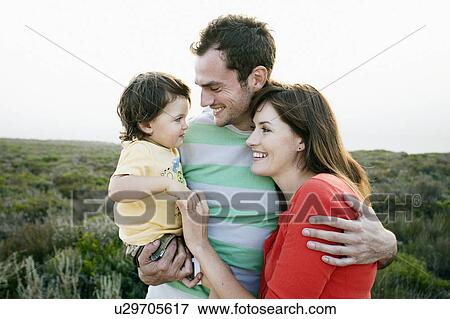 Couple with Child View Large Photo Image Stock Photo - Couple with Child. Fotosearch