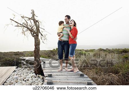 Stock Photograph - Couple with Child. Fotosearch