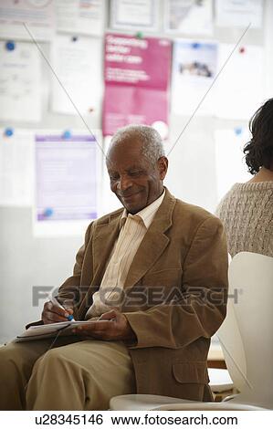 Elderly black man in waiting room View Large Photo Image Stock Photograph - Elderly black man in waiting room. Fotosearch