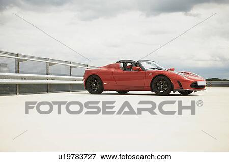 Electric car on parkdeck View Large Photo Image Stock Photo - Electric car on parkdeck. Fotosearch