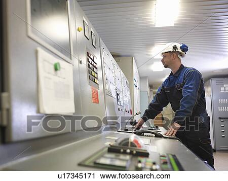 Engineer in Control Room of Ship View Large Photo Image Stock Image - Engineer in Control Room of Ship. Fotosearch