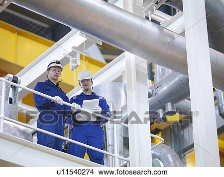 Engineer in Turbine Hall View Large Photo Image Picture - Engineer in Turbine Hall. Fotosearch