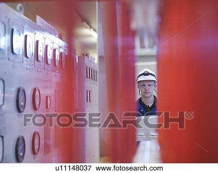 Stock Photo - Engineer in Turbine Hall. Fotosearch